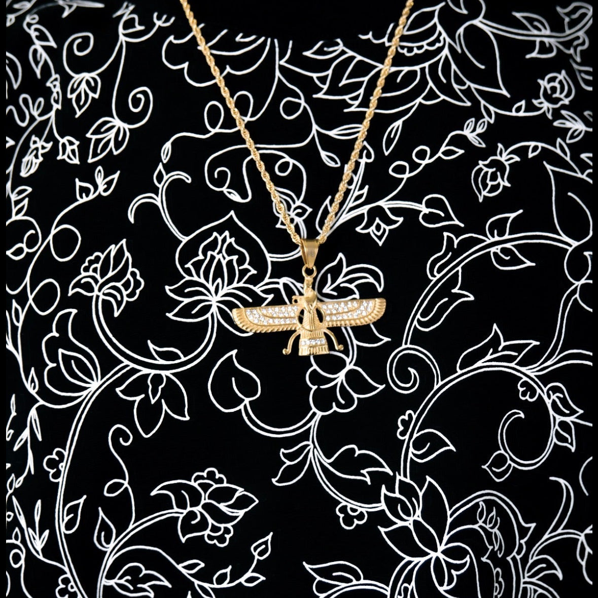 Gold Faravahar necklace with rhinestones